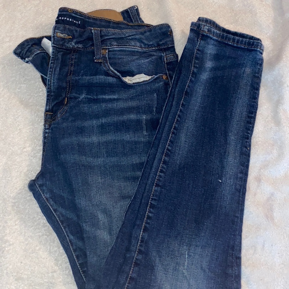 Aero pants dark blue jeans.